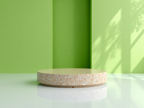 A light tan round platform against a green wall with a leaf shadow overlay