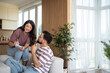 © Migma_Agency - Couple planning finances and budgeting at home living room