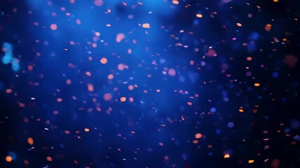 Poster - Colorful bokeh effect with shimmering particles against a deep blue background during nighttime celebration