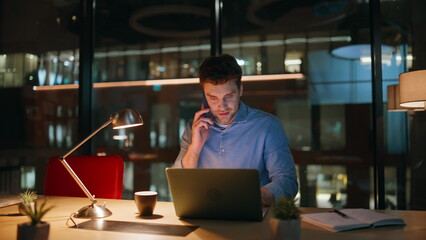 Poster - Company professional talking mobile phone at night office closeup. Smiling man