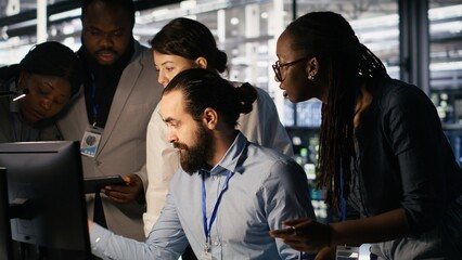 Aufkleber - Admins doing brainstorming in server hub, reviewing machine learning code and LLM visualization dashboards. Data center IT experts using computer to monitor AI infrastructure performance, camera A
