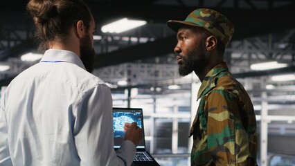 Poster - Army technicians in command center server room using artificial intelligence to detect cyber threats. Military data center experts use AI detection software to secure defense systems