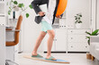 © Pixel-Shot - Young businessman with laptop and swim ring surfing in office. Summer vacation