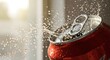 © Masaji - A close up of a red soda can with water droplets splashing out of the opened top in bright light