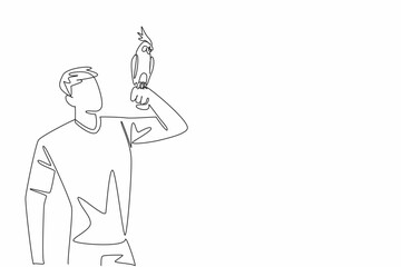 Poster - Single continuous line drawing white cockatiel bird perched on hand of man. Birds resulting from genetic mutations. The little crested parrot. Man Holding Bird. One line design vector illustration