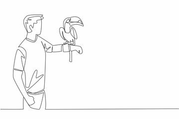 Poster - Single one line drawing toucan bird perched on hand of man. The most attractive bird in the zoo. Long orange beak. Not good at flying. Man Holding Bird. Continuous line design graphic illustration