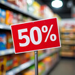 © Arief - Big 50% Discount Sign in Grocery Aisle