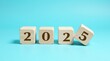 © Noman - New Year 2025: Wooden Blocks Displaying the Upcoming Year