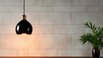 Poster - A sleek black pendant lamp hangs above a minimalistic space, creating a warm ambiance and showcasing modern design aesthetics that enhance the beauty of contemporary interiors.