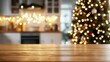 © Iaroslav - Wooden table foregrounding softly blurred christmas kitchen with twinkling tree lights and festive warmth