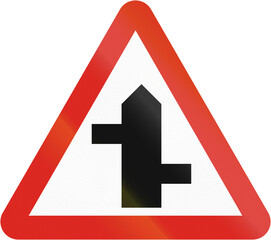 Fototapete - Warning road sign in Uganda - Staggered intersection ahead