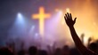 © MDSAJIB - A single hand raised in worship before a glowing cross during a vibrant atmospheric religious gathering