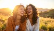 © Kaniaaaaa - Two happy women laughing and enjoying time together reflecting genuine female friendship joy and connection