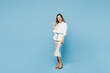 © ViDi Studio - Full body young employee business woman corporate lawyer wear shirt classic formal clothes work in office do winner gesture clench fist isolated on plain pastel light blue background studio portrait.