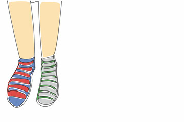 Poster - Single one line drawing different stripes between right and left. Comfort comes first, differences are a matter of taste. Colorful socks. Anti Bullying Day. Continuous line design graphic illustration