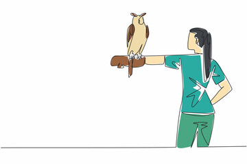 Poster - Single continuous line drawing the great horned owl perched on hand of woman. It has large and striking ear tufts. King of all owls. The owl. Woman Holding Bird. One line design vector illustration