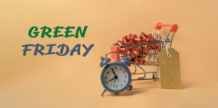 Shopping cart with a clock on it and the words Green Friday written below it