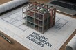 © Creative mind - A detailed architectural model sits atop blueprints, exemplifying the essence of Building Information Modeling. A modern workspace is equipped for architectural planning and design.
