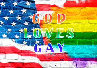 Poster - Banner that says God loves gay and is on a wall