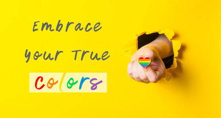 Poster - Hand holding a rainbow heart with the words embrace your true colors