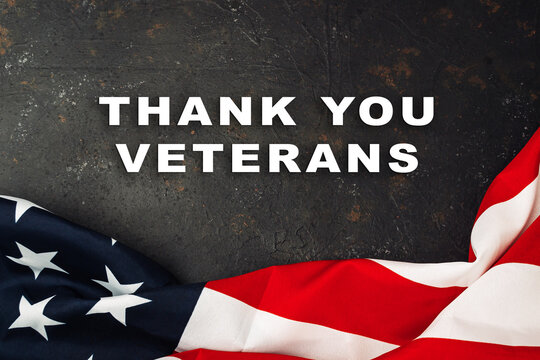 Flag with the words Thank You Veterans written below it