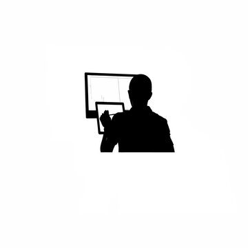 Silhouette of a digital artist designing characters on a large screen on white background