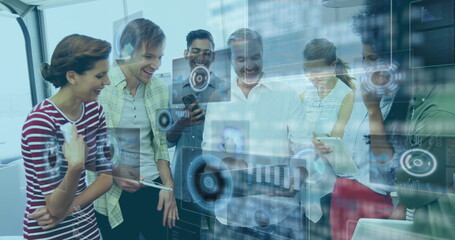 Poster - Team of seven professionals examining holographic panels in boardroom, with tablets phones laptop