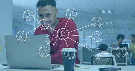 Poster - Man working on laptop with network connections image overlay in office