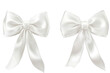 © Pavel - Elegant white ribbon bows displayed on a transparent background, perfect for various decoration and gift wrapping purposes