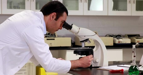 Poster - Scientist placing slide on microscope, rotating knob and sharpening lab view with animated rings