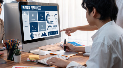 Poster - Human resources management software on computer screen helping human resources employee to manage recruitment, payroll, staff searching and KPI evaluation brisk
