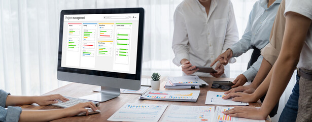 Aufkleber - Project planning software for brisk business project management on the computer screen showing timeline chart of the team project