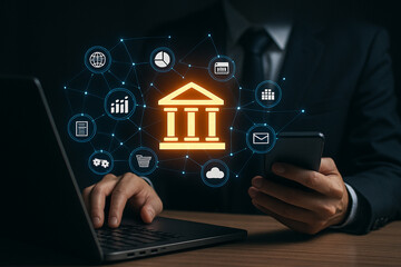 Poster - Man using laptop and phone with digital banking icons overlayed in a dark business setting online