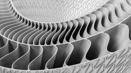 Poster - metal piece with a pattern created by 3D printer. lines are arranged in a spiral pattern, creating a sense of movement and energy Adaptive technologies concept background