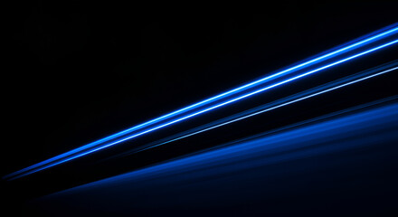 Poster - Futuristic blue light trails on a black background with a sense of motion and speed