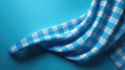 Fototapete - Soft Blue and White Checkered Fabric Draped Over a Bright Blue Surface, Perfect for Backgrounds and Textiles in Fashion and Design Projects