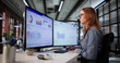 © Andrey Popov - Young Woman Analyzing Financial Data On Computer