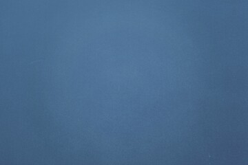 Poster - Uniform blue textured surface is filling full frame in flat design and creating abstract backdrop