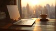 © Toko - Laptop, mug, and phone sit on desk by window with a cityscape at golden hour