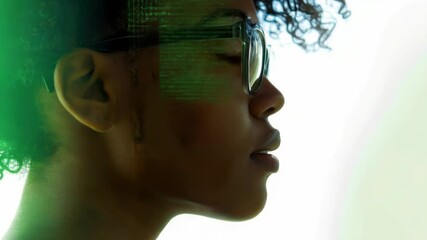 Poster - A woman wearing glasses sitting on a green background