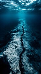 Poster - Underwater view revealing a geological fault line slicing through the seabed, creating a deep chasm illuminated by sunlight filtering through the water