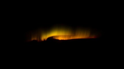Wall Mural - Intense black sky, warm golden hour light illuminating aurora, deep shadows, soft light, pure black background, beautiful and amazing view