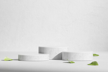 Fototapete - 3d Rendering. Minimalist White Product Display Podium with Green Leaves on a Clean Background for Cosmetic or Beauty Presentation