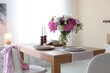 © New Africa - Beautiful table setting with bouquet of peonies in dining room. Interior design