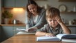 © Pete - Young boy studies at home, feeling stressed, concerned about school. Mother or older sister helps with homework in kitchen, providing support. Concept of learning, family, education.