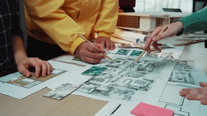 Poster - A dynamic scene depicting hands actively engaged in collaborative design and planning, showcasing creativity and teamwork in a modern office setting. SACTR