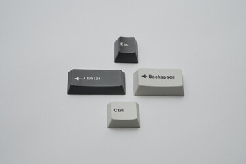 Fototapete - Photographic composition of essential keyboard keys Esc Enter Backspace Ctrl for technology UI UX concepts and minimalist design