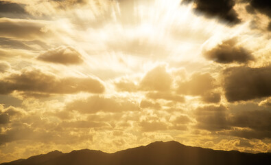 Wall Mural - orange light through the cloud