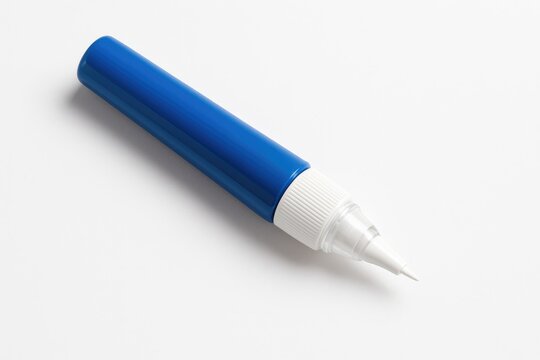 White background with a blue pen used for correction