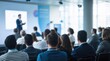 © VistaVisions - Presenter Presenting on Stage at Conference Meeting. Professional Lecture with Attendees. Blurred De-focused Unidentifiable Presenter and Audience. Corporate Executive Manager Speaker